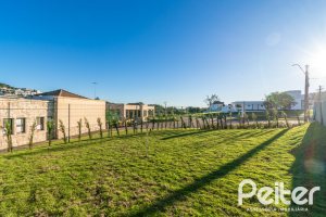 Casa em Condomínio à venda com 345m², 3 dormitórios, 3 suítes, 4 vagas, no bairro Alphaville em PORTO ALEGRE