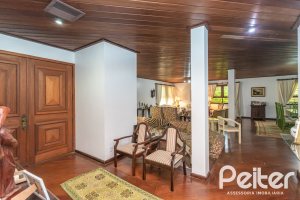 Casa em Condomínio à venda com 701m², 6 dormitórios, 2 suítes, 10 vagas, no bairro Cavalhada em PORTO ALEGRE