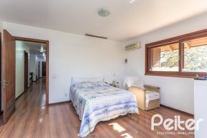 Casa em Condomínio à venda com 701m², 6 dormitórios, 2 suítes, 10 vagas, no bairro Cavalhada em PORTO ALEGRE