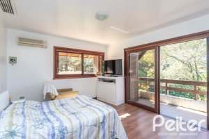 Casa em Condomínio à venda com 701m², 6 dormitórios, 2 suítes, 10 vagas, no bairro Cavalhada em PORTO ALEGRE