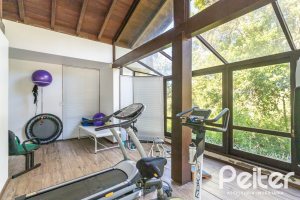 Casa em Condomínio à venda com 701m², 6 dormitórios, 2 suítes, 10 vagas, no bairro Cavalhada em PORTO ALEGRE