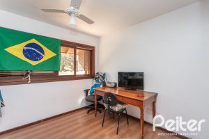 Casa em Condomínio à venda com 701m², 6 dormitórios, 2 suítes, 10 vagas, no bairro Cavalhada em PORTO ALEGRE