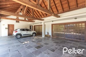 Casa em Condomínio à venda com 701m², 6 dormitórios, 2 suítes, 10 vagas, no bairro Cavalhada em PORTO ALEGRE