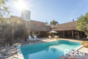 Casa em Condomínio à venda com 701m², 6 dormitórios, 2 suítes, 10 vagas, no bairro Cavalhada em PORTO ALEGRE