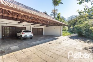 Casa em Condomínio à venda com 701m², 6 dormitórios, 2 suítes, 10 vagas, no bairro Cavalhada em PORTO ALEGRE