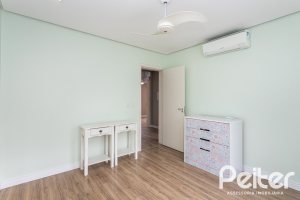 Casa em Condomínio à venda com 136m², 3 dormitórios, 1 suíte, 2 vagas, no bairro Hípica em Porto Alegre