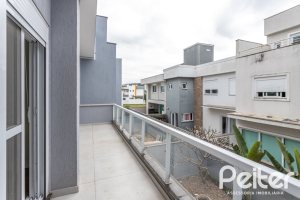 Casa em Condomínio à venda com 136m², 3 dormitórios, 1 suíte, 2 vagas, no bairro Hípica em Porto Alegre
