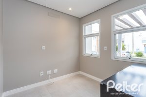 Casa em Condomínio à venda com 136m², 3 dormitórios, 1 suíte, 2 vagas, no bairro Hípica em Porto Alegre