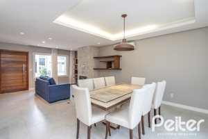 Casa em Condomínio à venda com 136m², 3 dormitórios, 1 suíte, 2 vagas, no bairro Hípica em Porto Alegre