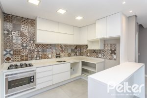 Casa em Condomínio à venda com 136m², 3 dormitórios, 1 suíte, 2 vagas, no bairro Hípica em Porto Alegre