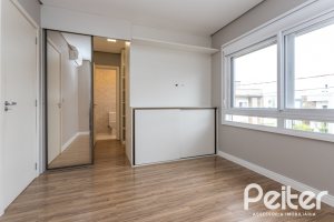 Casa em Condomínio à venda com 136m², 3 dormitórios, 1 suíte, 2 vagas, no bairro Hípica em Porto Alegre