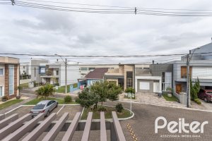 Casa em Condomínio à venda com 136m², 3 dormitórios, 1 suíte, 2 vagas, no bairro Hípica em Porto Alegre