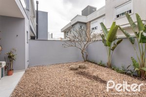 Casa em Condomínio à venda com 136m², 3 dormitórios, 1 suíte, 2 vagas, no bairro Hípica em Porto Alegre