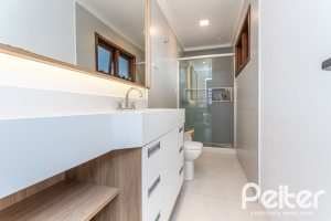 Casa em Condomínio à venda com 212m², 4 dormitórios, 1 suíte, 2 vagas, no bairro Espírito Santo em Porto Alegre