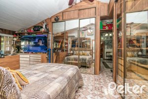 Casa à venda com 650m², 5 dormitórios, 5 suítes, 5 vagas, no bairro Vila Assunção em Porto Alegre