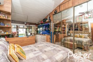 Casa à venda com 650m², 5 dormitórios, 5 suítes, 5 vagas, no bairro Vila Assunção em Porto Alegre