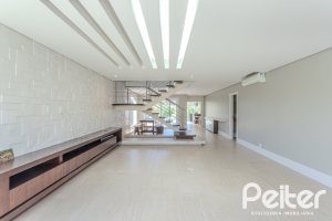 Casa em Condomínio à venda com 270m², 3 dormitórios, 2 suítes, 3 vagas, no bairro Terra Ville em PORTO ALEGRE