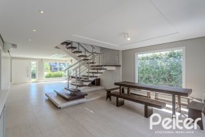 Casa em Condomínio à venda com 270m², 3 dormitórios, 2 suítes, 3 vagas, no bairro Terra Ville em PORTO ALEGRE