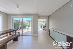 Casa em Condomínio à venda com 270m², 3 dormitórios, 2 suítes, 3 vagas, no bairro Terra Ville em PORTO ALEGRE