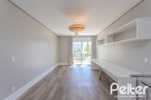 Casa em Condomínio à venda com 270m², 3 dormitórios, 2 suítes, 3 vagas, no bairro Terra Ville em PORTO ALEGRE