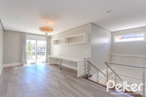Casa em Condomínio à venda com 270m², 3 dormitórios, 2 suítes, 3 vagas, no bairro Terra Ville em PORTO ALEGRE