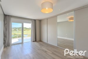 Casa em Condomínio à venda com 270m², 3 dormitórios, 2 suítes, 3 vagas, no bairro Terra Ville em PORTO ALEGRE