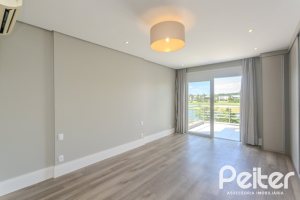 Casa em Condomínio à venda com 270m², 3 dormitórios, 2 suítes, 3 vagas, no bairro Terra Ville em PORTO ALEGRE