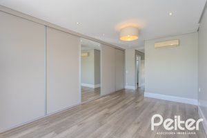 Casa em Condomínio à venda com 270m², 3 dormitórios, 2 suítes, 3 vagas, no bairro Terra Ville em PORTO ALEGRE
