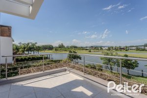 Casa em Condomínio à venda com 270m², 3 dormitórios, 2 suítes, 3 vagas, no bairro Terra Ville em PORTO ALEGRE