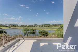 Casa em Condomínio à venda com 270m², 3 dormitórios, 2 suítes, 3 vagas, no bairro Terra Ville em PORTO ALEGRE
