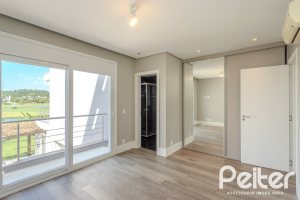 Casa em Condomínio à venda com 270m², 3 dormitórios, 2 suítes, 3 vagas, no bairro Terra Ville em PORTO ALEGRE