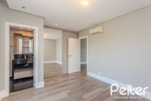 Casa em Condomínio à venda com 270m², 3 dormitórios, 2 suítes, 3 vagas, no bairro Terra Ville em PORTO ALEGRE