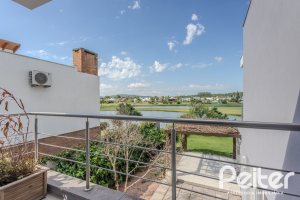Casa em Condomínio à venda com 270m², 3 dormitórios, 2 suítes, 3 vagas, no bairro Terra Ville em PORTO ALEGRE