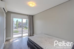 Casa em Condomínio à venda com 270m², 3 dormitórios, 2 suítes, 3 vagas, no bairro Terra Ville em PORTO ALEGRE