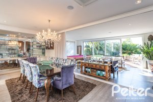 Casa em Condomínio à venda com 510m², 4 dormitórios, 4 suítes, 6 vagas, no bairro Terra Ville em PORTO ALEGRE