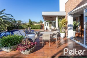 Casa em Condomínio à venda com 510m², 4 dormitórios, 4 suítes, 6 vagas, no bairro Terra Ville em PORTO ALEGRE