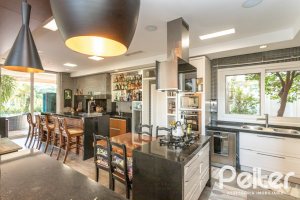 Casa em Condomínio à venda com 510m², 4 dormitórios, 4 suítes, 6 vagas, no bairro Terra Ville em PORTO ALEGRE