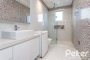 Casa em Condomínio à venda com 510m², 4 dormitórios, 4 suítes, 6 vagas, no bairro Terra Ville em PORTO ALEGRE