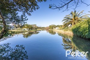 Casa em Condomínio à venda com 510m², 4 dormitórios, 4 suítes, 6 vagas, no bairro Terra Ville em PORTO ALEGRE