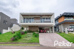 Casa em Condomínio à venda com 295m², 3 dormitórios, 3 suítes, 4 vagas, no bairro Alphaville em PORTO ALEGRE