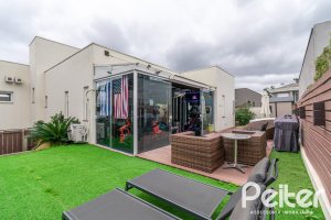 Casa em Condomínio à venda com 295m², 3 dormitórios, 3 suítes, 4 vagas, no bairro Alphaville em PORTO ALEGRE