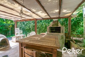 Casa à venda com 374m², 4 dormitórios, 2 suítes, 4 vagas, no bairro Vila Assunção em Porto Alegre