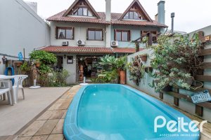 Casa à venda com 274m², 3 dormitórios, 1 suíte, 4 vagas, no bairro Ipanema em Porto Alegre