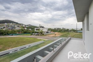 Casa em Condomínio à venda com 331m², 3 dormitórios, 3 suítes, 2 vagas, no bairro Alphaville em PORTO ALEGRE