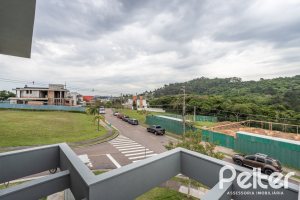 Casa em Condomínio à venda com 331m², 3 dormitórios, 3 suítes, 2 vagas, no bairro Alphaville em PORTO ALEGRE
