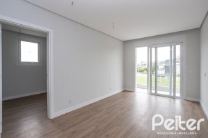 Casa em Condomínio à venda com 331m², 3 dormitórios, 3 suítes, 2 vagas, no bairro Alphaville em PORTO ALEGRE