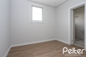 Casa em Condomínio à venda com 331m², 3 dormitórios, 3 suítes, 2 vagas, no bairro Alphaville em PORTO ALEGRE