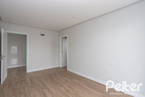 Casa em Condomínio à venda com 331m², 3 dormitórios, 3 suítes, 2 vagas, no bairro Alphaville em PORTO ALEGRE