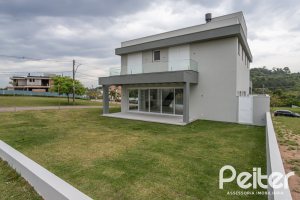 Casa em Condomínio à venda com 331m², 3 dormitórios, 3 suítes, 2 vagas, no bairro Alphaville em PORTO ALEGRE