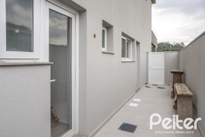 Casa em Condomínio à venda com 331m², 3 dormitórios, 3 suítes, 2 vagas, no bairro Alphaville em PORTO ALEGRE